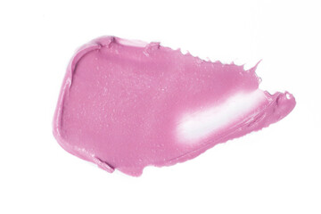 Creamy pink makeup or cosmetics product smeared on white	
