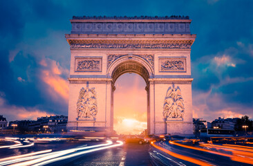 View of famous Arc de Triomphe at sunset