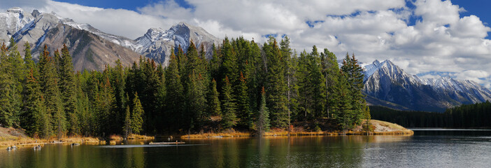 Panorama of Fairholme Range mountains at Johnson Lake Banff National Park