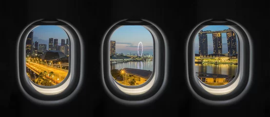 Fototapeten View outside the plane window. Singapore City. © oneSHUTTER oneMEMORY