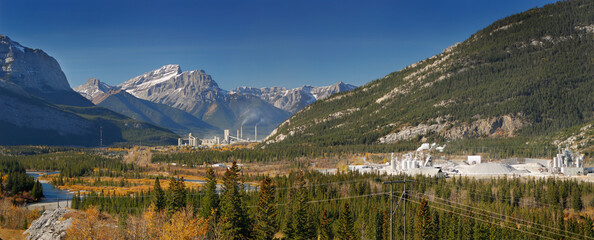 Panorama of Exshaw cement factories and Bow Valley with Canadian Rockies