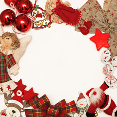 White background with red Christmas decorations. Frame. Copy space, happy New year greetings, merry Christmas blog posts. Flat lay, owerview photo for wishes for friends, clients, kids. Winter time