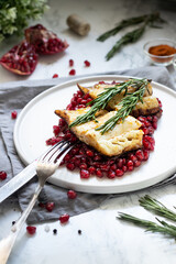 Cod fish with pomegranate seeds 