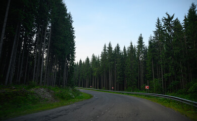 Fototapeta premium Road collapse. Highway in mountains. mountain beautiful view. fog in the mountains. 