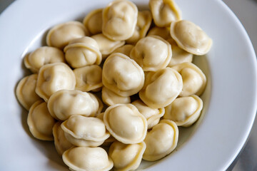 Boiled dumplings on a white plate