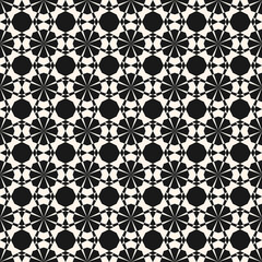 Vector ornamental geometric seamless pattern. Elegant black and white geometrical texture. Simple monochrome background with grid, net, octagons, triangles. Repeatable design for decor, fabric, print