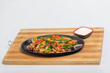 Chicken mushroom and capsicum stir fry recipe served on a sizzling plate. Chicken Fajita Recipe, Asian recipes.