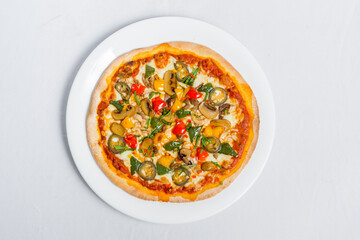 Hot fresh Chicken mushroom jalapeno pizza on white plate isolated white background. Homemade Pizza. Top views.