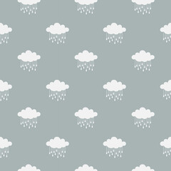 Clouds and rain drops vector seamless pattern. White cloud on blue background pattern for print, fabric or paper.