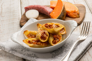 filled pasta with sausage and pumpkin