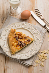 cake with spinach egg and almond flakes