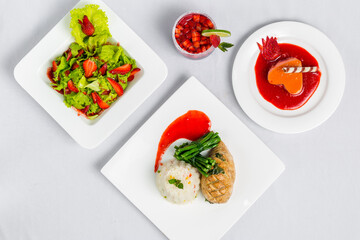 Valentine's day special dinner course food platter on isolated white background. Valentine's meal platter. Valentine's day food offer.