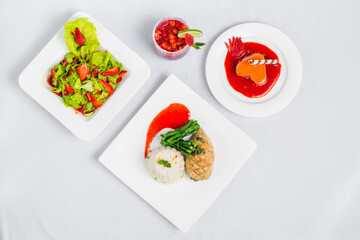 Valentine's day special dinner course food platter on isolated white background. Valentine's meal platter. Valentine's day food offer.