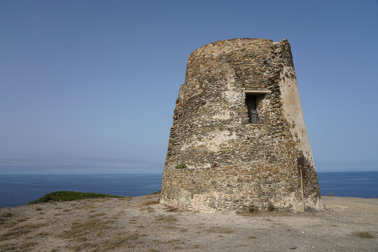 SARDINIA, TORRE DEI CORSARI WITH BLUE SEA. TOWER AGAINST PIRATES.