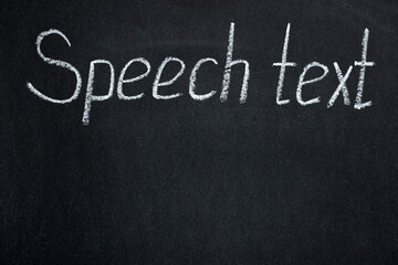 Fototapeta premium Lettering on a dark board Speech text