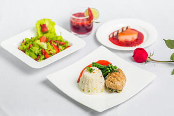 Valentine's day special dinner course food platter on isolated white background. Valentine's meal platter. Valentine's day food offer.