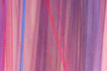 Backdrop of multicolored veils with light effects