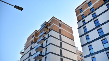 Architectural details of modern apartment building. Modern european residential apartment building complex.