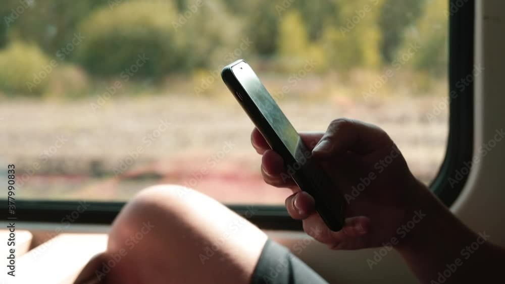 Poster a man uses a phone in his hands when talking with an interlocutor. using mobile web searches to vali