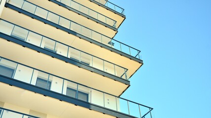 Architectural details of modern apartment building. Modern european residential apartment building complex.