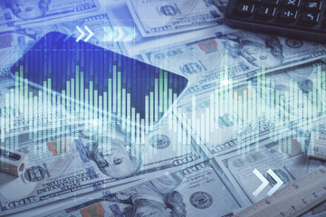 Double exposure of forex graph drawing over us dollars bill background. Concept of financial markets.