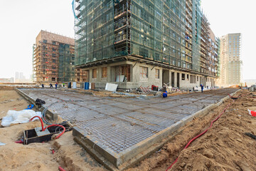 Construction of road. Sandy platform under roadway road roller (compactor, just roller). Flattened...