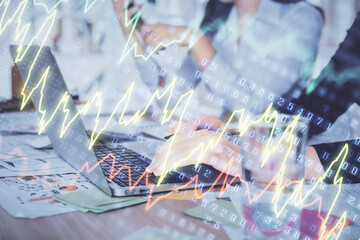 Multi exposure of woman hands typing on computer and forex chart hologram drawing. Stock market analysis concept.