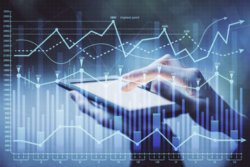 Double exposure of forex chart sketch hologram and woman holding and using a mobile device. Financial market concept.