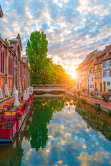 Spectacular colorful traditional french houses on the side of river Lauch in Petite...
