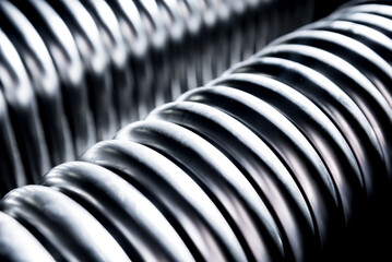 Abstract industrial background of metal pipes construction.
