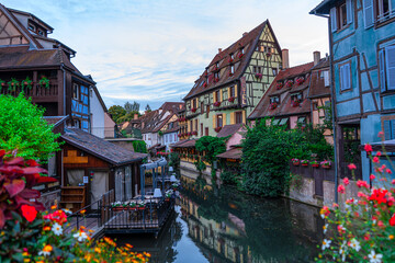 Spectacular colorful traditional french houses on the side of river Lauch in Petite...