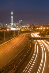Fototapeta na wymiar Sky Tower and Traffic Lights, Auckland, New Zealand