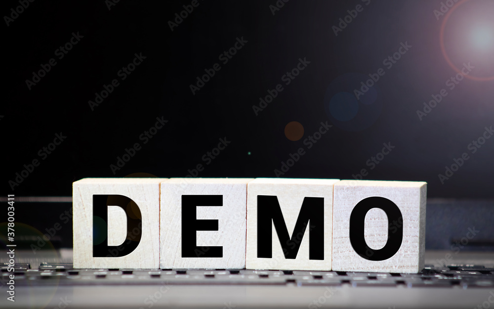 Poster demo word made with building blocks isolated on white