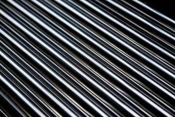Abstract background of steel pipes stacked on a pallet