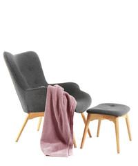 Stylish armchair and ottoman on white background