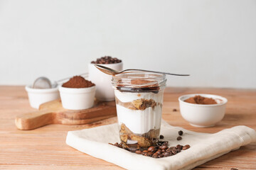 Composition with tasty tiramisu on table