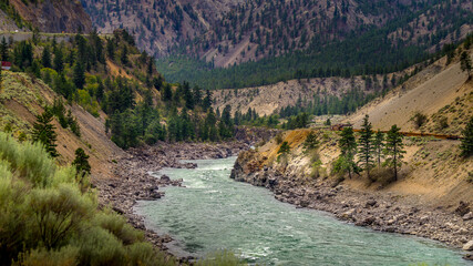 Thompson River with its many rapids flowing through the Canyon in the Coastal Mountain Ranges of British Columbia, Canada