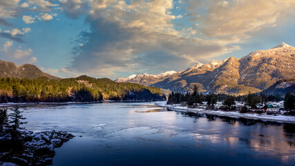 Partly ice covered Fraser River as it passes the town of Hope at the start of the Fraser Canyon Route in British Columbia, Canada