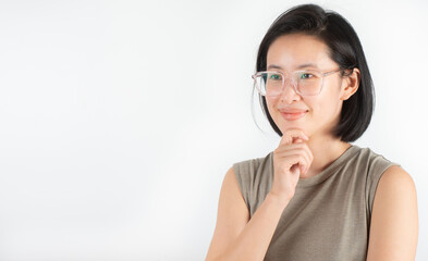 A cute Asian woman with short black hair, white teeth and big eyeglasses is smiling happily.