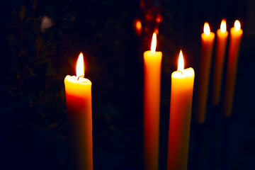 Burning Wax Candles with dark background