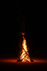 Camp fire in the night. Burning wood at night. Campfire at touristic camp at nature in dark. Flame...