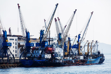 Fototapeta premium Commercial coasters are loading at the commercial port of Vladivostok.