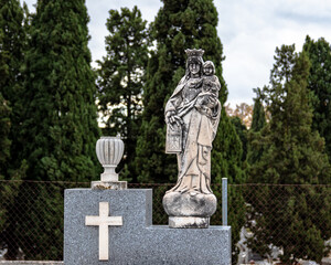 Statue in the cemetery during the daytime