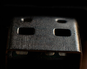Closeup shot of the USB plug in the darkness