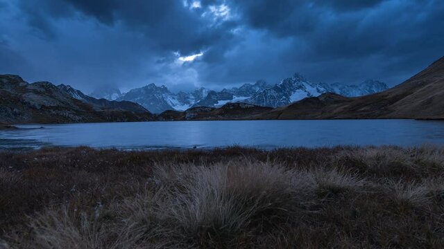 Time-lapse of clouds over Fenetre lakes during blue hour. Swiss