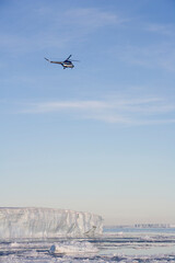 Fototapeta na wymiar Helicopter Above Iceberg, Antarctica
