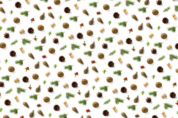 christmas background with pine cone, wine cork, pine twig and lingonberry. christmas background on white backdrop.