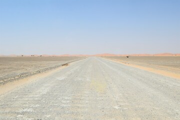 Fototapeta na wymiar Amazing travel in the desert road in oman. vehicles. Muscat, oman : 15-09-2020
