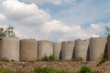 concrete pipe wall on a sunny day. fence