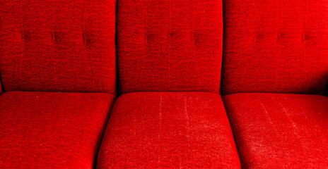 Texture detail of red cover soft cotton cloth sofa